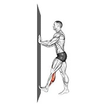 Calf Push Stretch With Hands Against Wall
